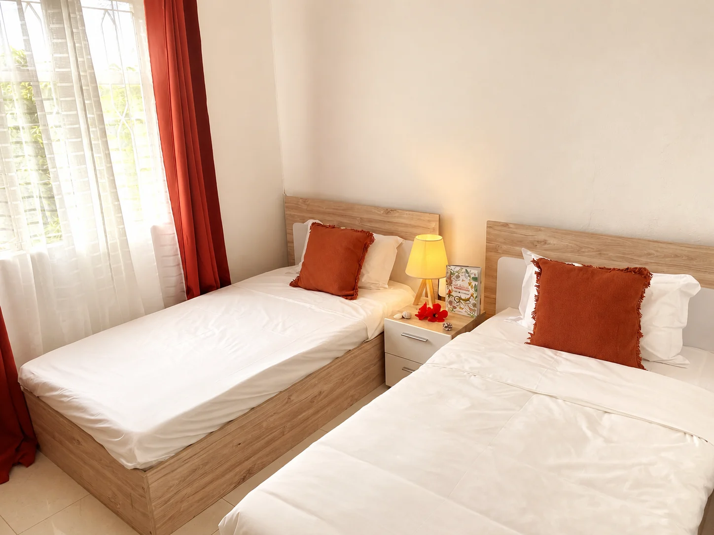 Chambre avec deux lits simples
